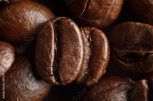 Macro shot of coffee roasted beans background