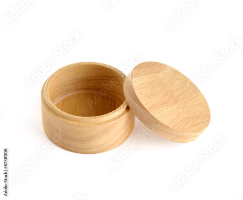 round wooden box on white background