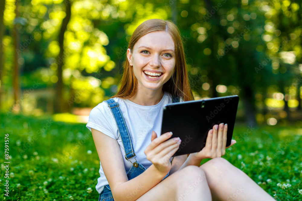 Beautiful smiling red-haired young woman Beautiful smiling red-haired young woman