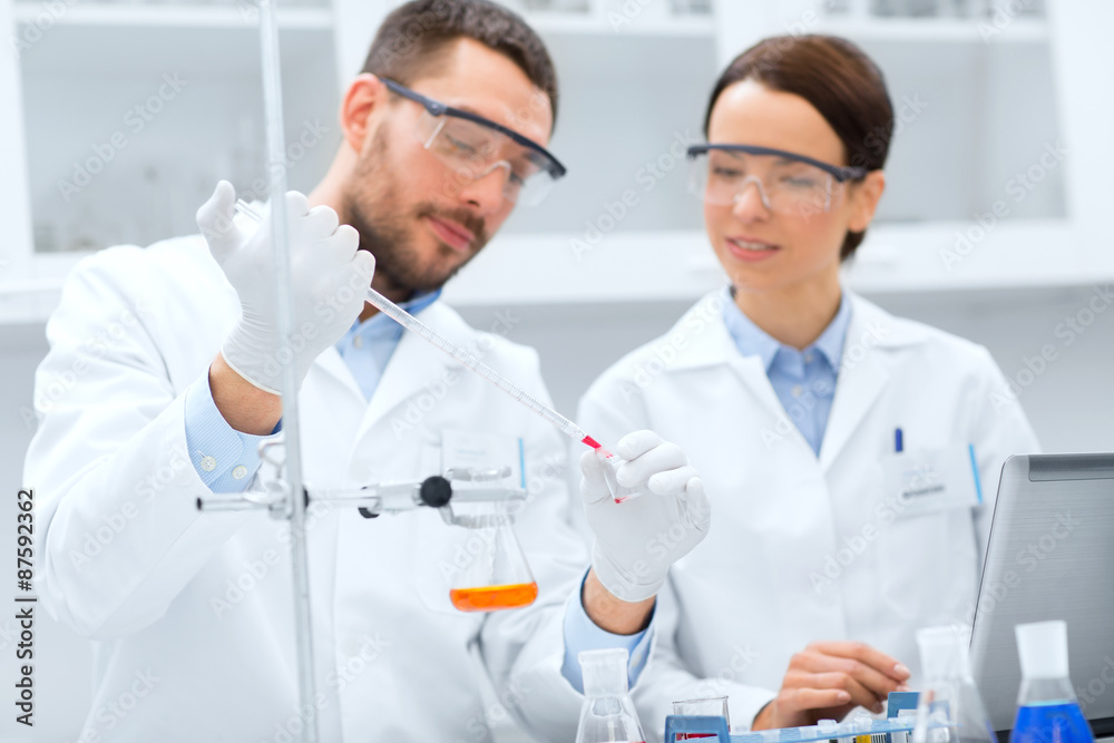 young scientists making test or research in lab young scientists making test or research in lab
