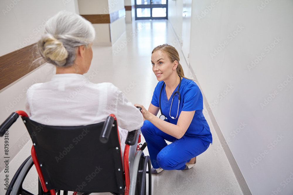 nurse with senior woman in wheelchair at hospital nurse with senior woman in wheelchair at hospital