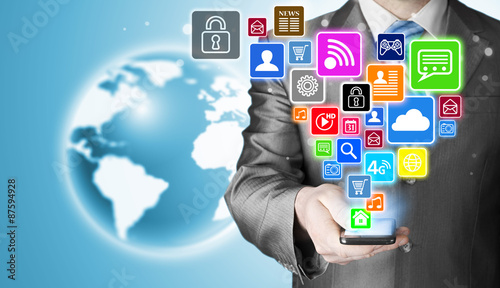 Business man using smart phone with social media icon set