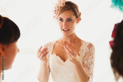 beautiful gorgeous blonde bride crying, hawai colorful sand ceremony on cyprus