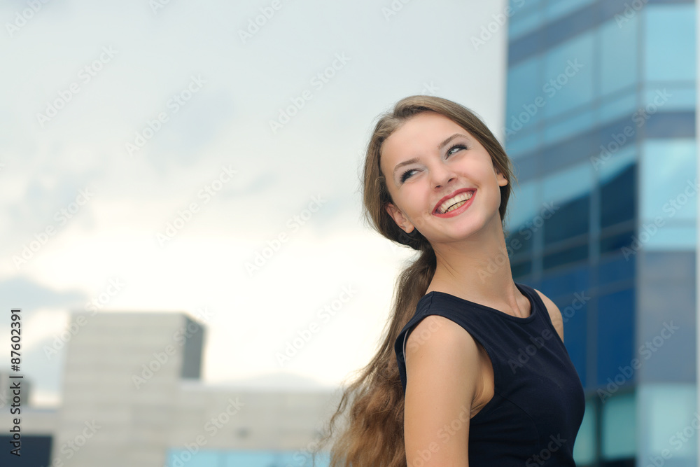 Portrait of a joyful and happy business woman