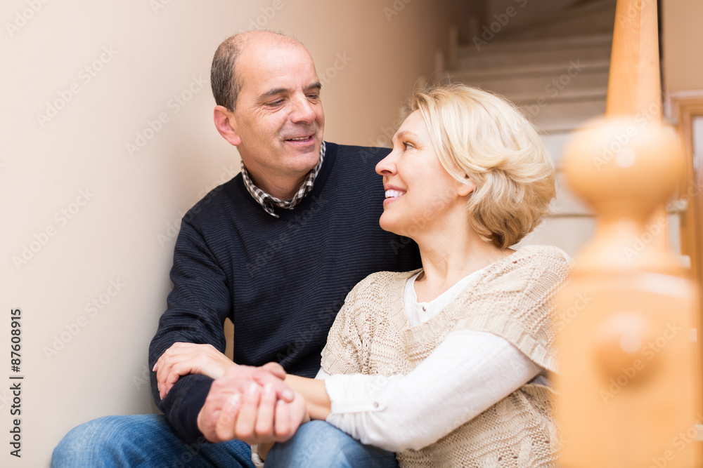 Fototapeta premium Mature couple near staircase