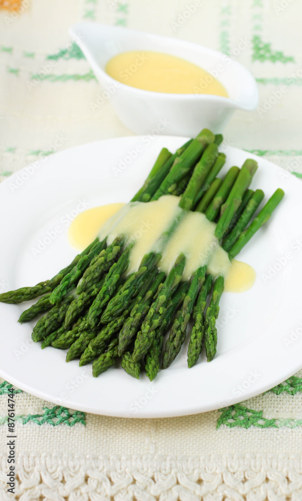 freshly cooked green asparagus with hollandaise sauce freshly cooked green asparagus with hollandaise sauce