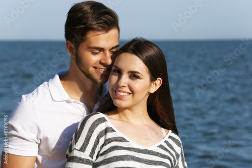 Beautiful young couple on beach
