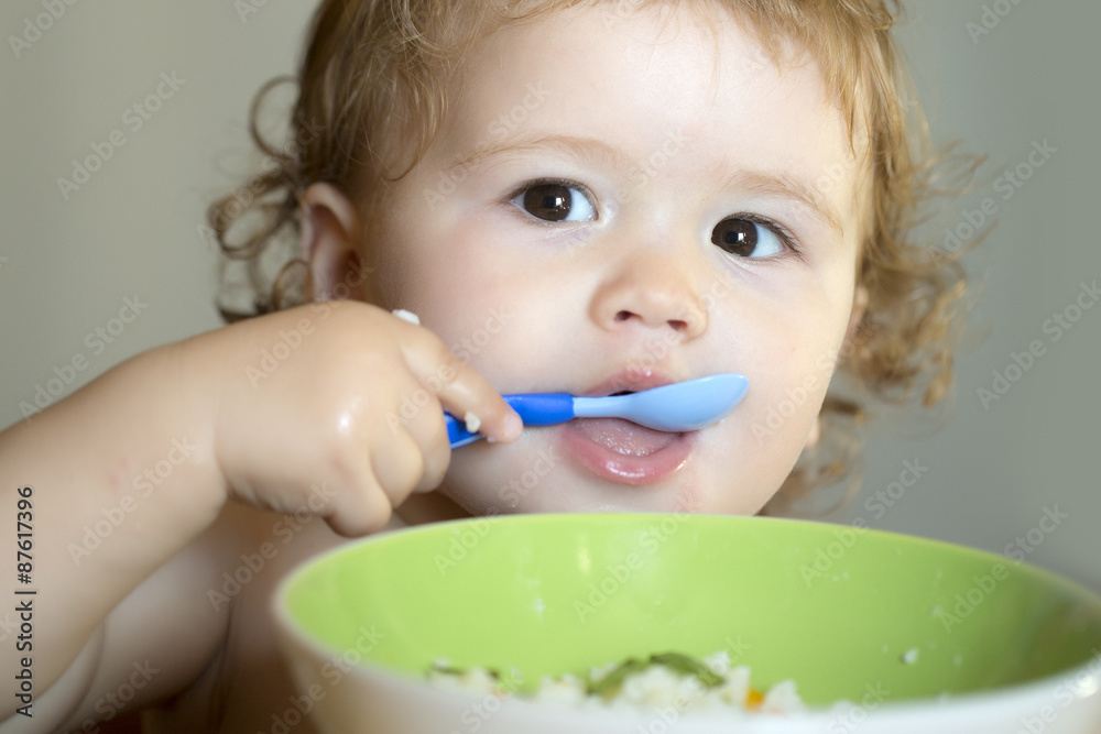 Portrait of cute child eating Portrait of cute child eating
