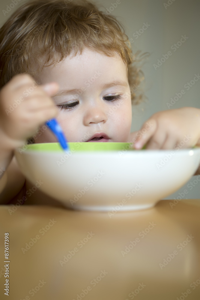 Portrait of beautiful boy eating Portrait of beautiful boy eating