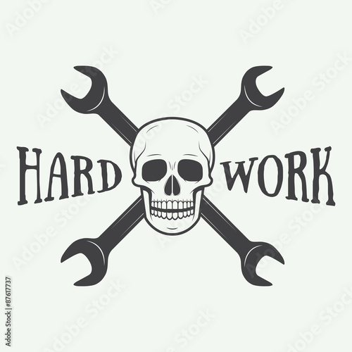 Vintage vector mechanic logo label with skull, wrench. Vector illustration