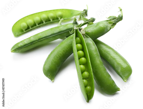 Fresh green peas isolated on white