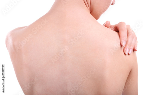 Young girl with back pain close up