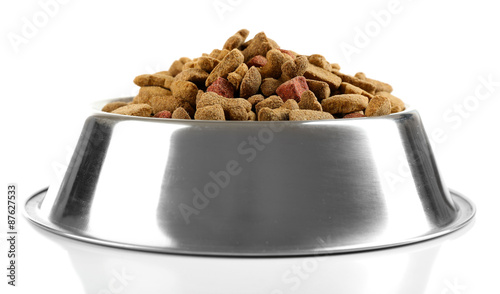 Dog food in bowl, isolated on white