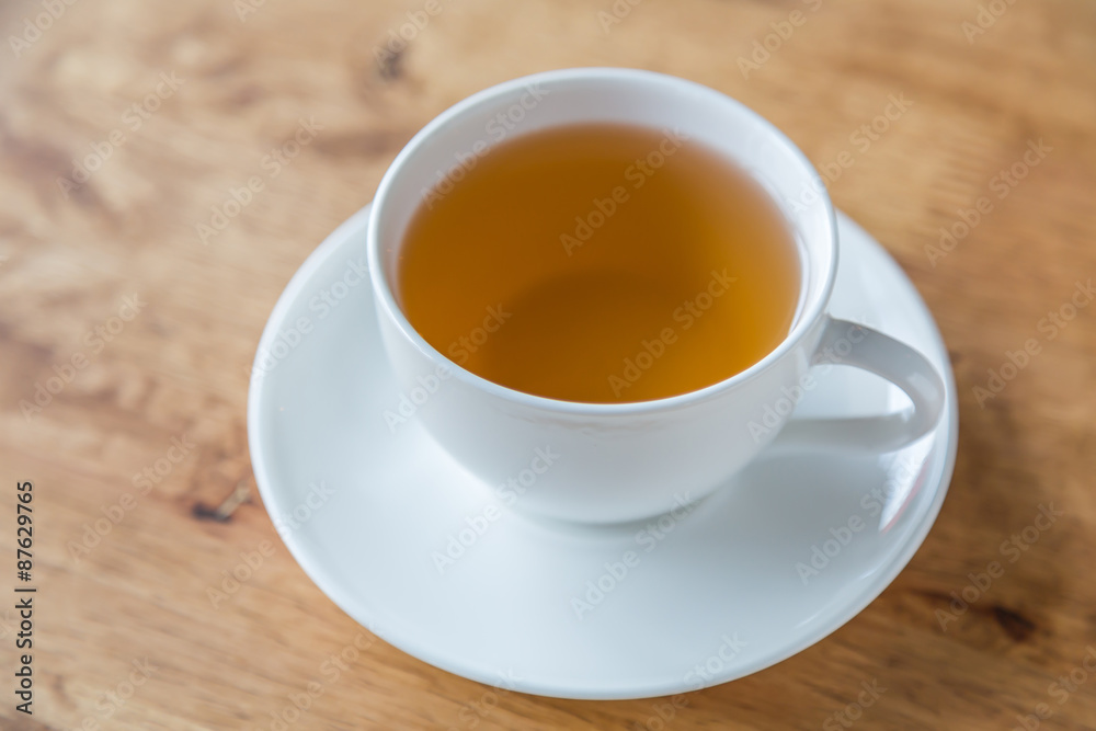 Cup of tea on a wooden table Cup of tea on a wooden table