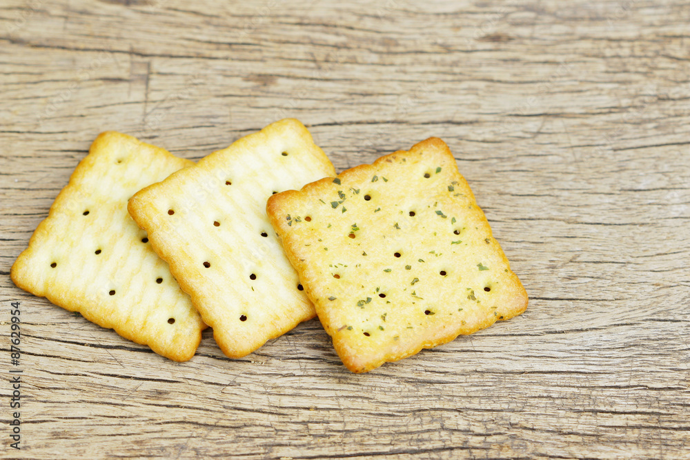 Fototapeta premium Crackers on wooden table
