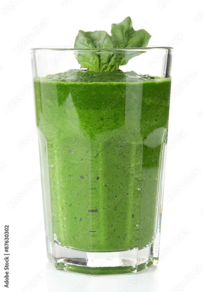 Glass of green vegetable juice with basil isolated on white Glass of green vegetable juice with basil isolated on white