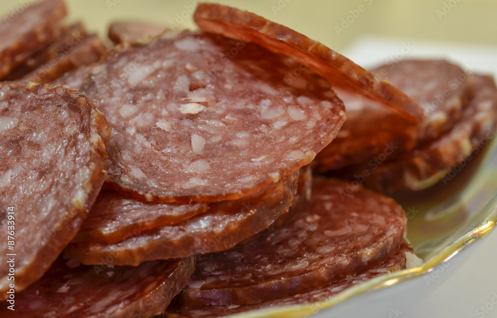 Salami sausage slices background
