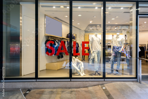 sale word on shopfront display window