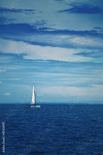 Boat Sailing at Blue Sea © Bits and Splits