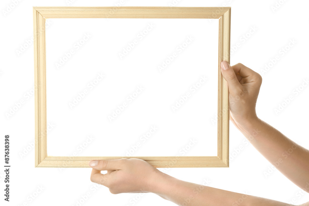 Female hands with wooden frame, isolated on white Female hands with wooden frame, isolated on white
