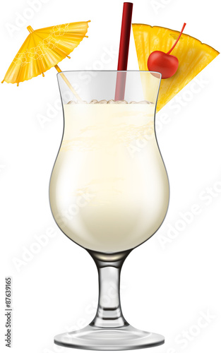 Pina colada glass decorated with cherry, pineapple and cocktail umbrella.