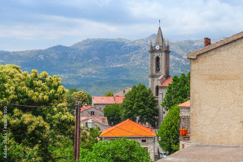 Corsican landscape, old houses and bell tower