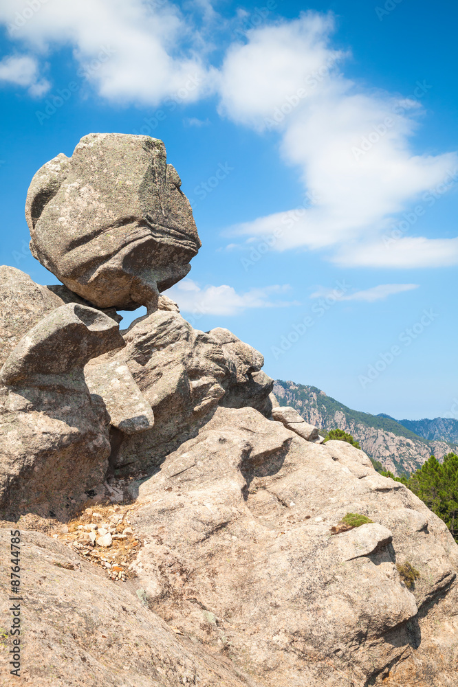 Big round stone on top of the mountain, Corsica Big round stone on top of the mountain, Corsica