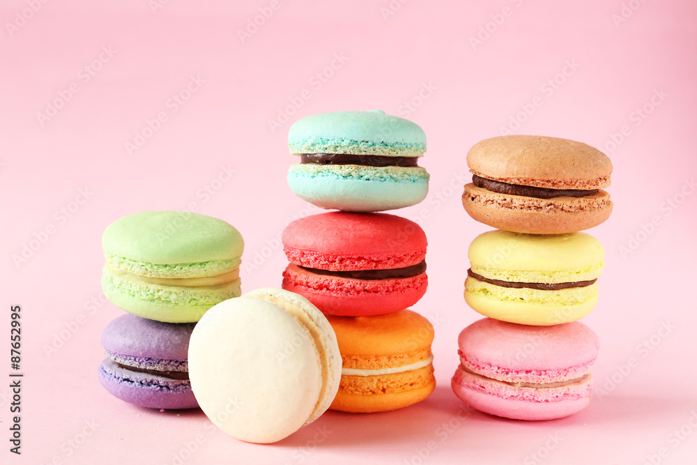 French colorful macarons on pink background French colorful macarons on pink background