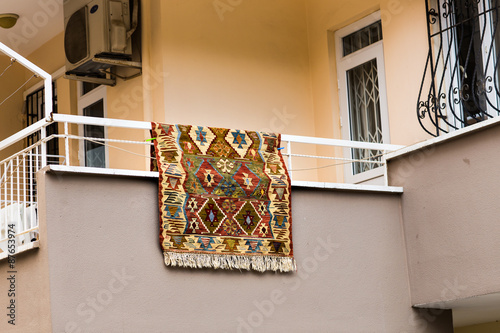 carpet   hanging on balcony photo