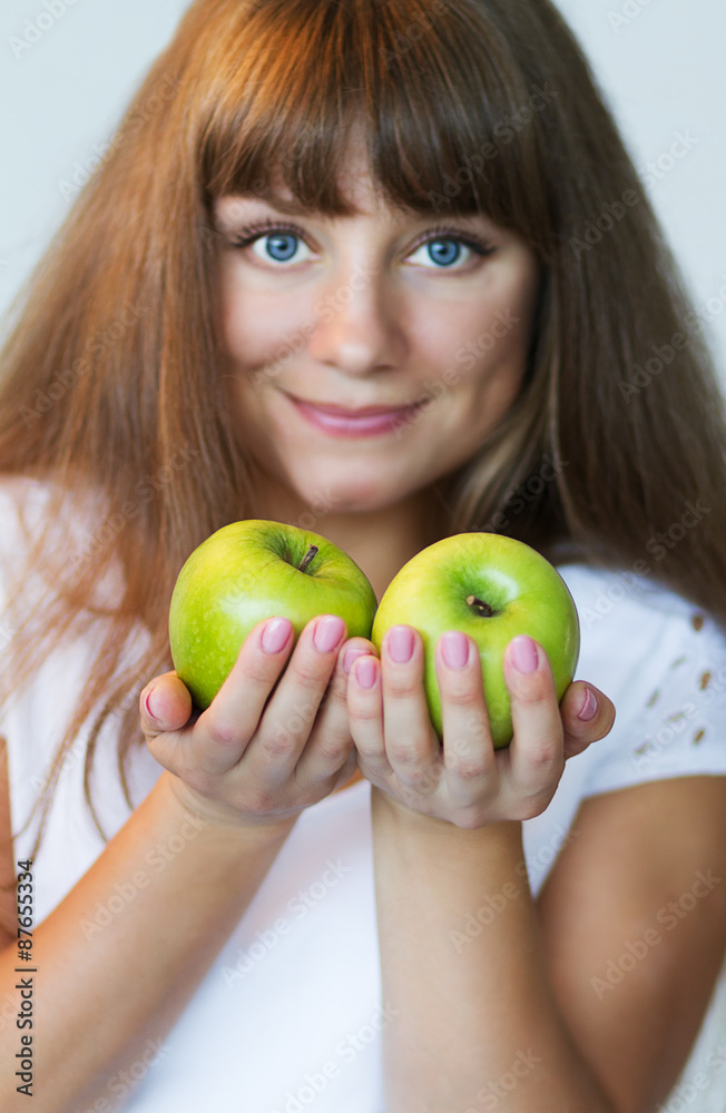 Girl and green apple