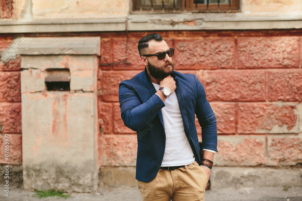 Two stylish bearded men on the background of each other Two stylish bearded men on the background of each other