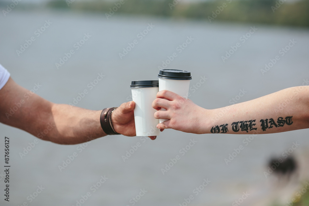 cheers using two cups of coffee