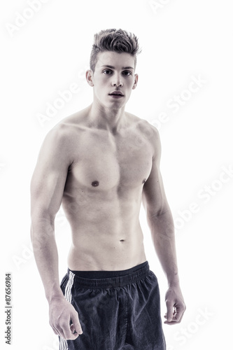 Handsome young bodybuilder in relaxed pose
