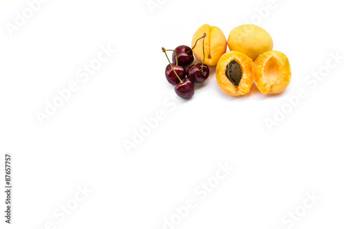 apricots and sweet cherries  isolated