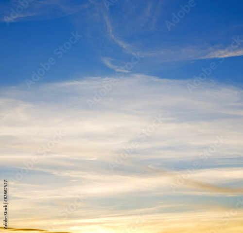 Fototapeta Naklejka Na Ścianę i Meble -  sunrise in the colored sky white soft clouds and abstract backgr