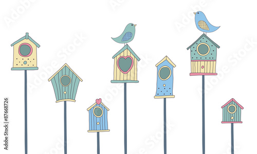 A set of cute bird houses and birds in a row
