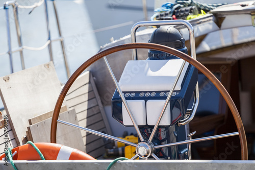 Steering wheel and accessories on the yacht