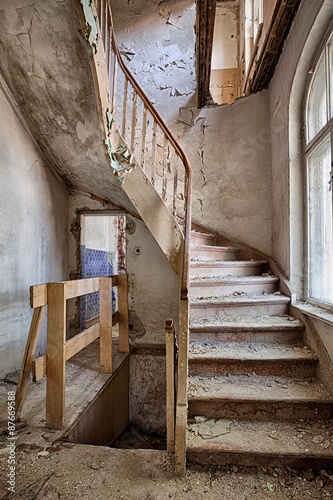 Wooden stairs in an abandoned house