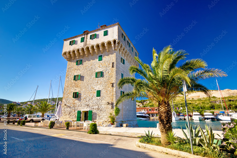 Stone tower in adriatic town of Marina