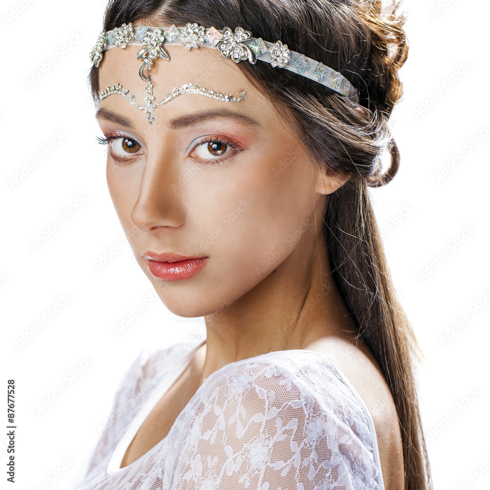 Glamor close up portrait of a young woman on a white background Glamor close up portrait of a young woman on a white background