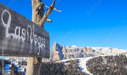 Photography The sign of the restaurant in the mountains. Ski resort of Selva