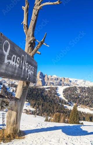 Photography The sign of the restaurant in the mountains. Ski resort of Selva
