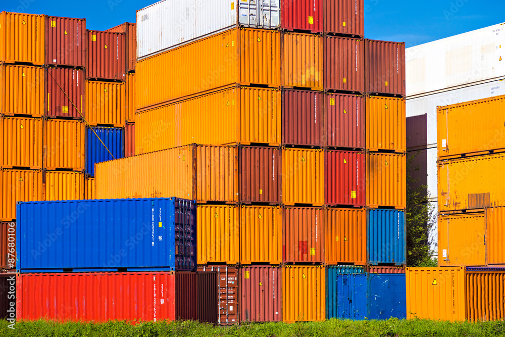 Orange containers stacked in Port of Rotterdam Orange containers stacked in Port of Rotterdam