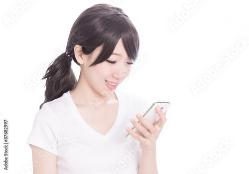 Happy college girl holding up smart phone