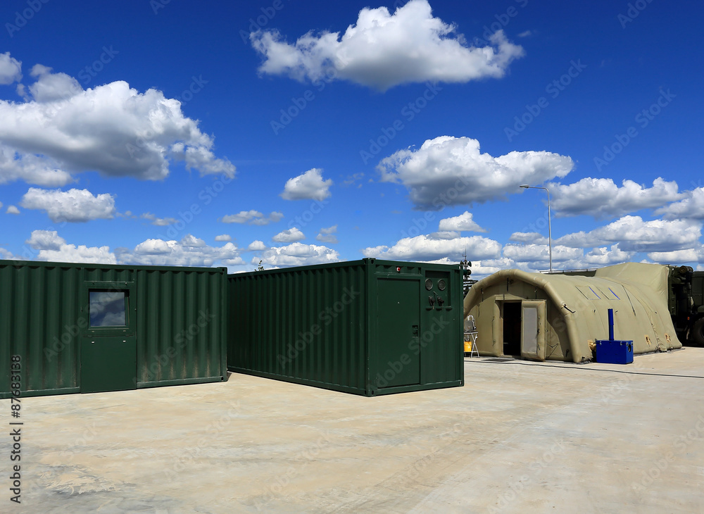 Containers and the tent