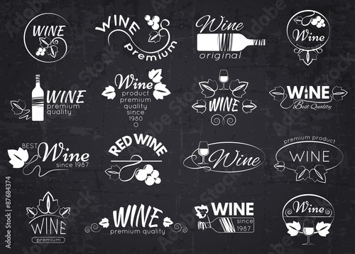 Set of wine labels, badges and logos for design over blackboard