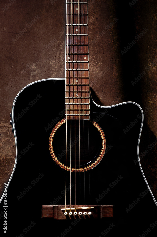 Fototapeta premium Detail of black acoustic guitar