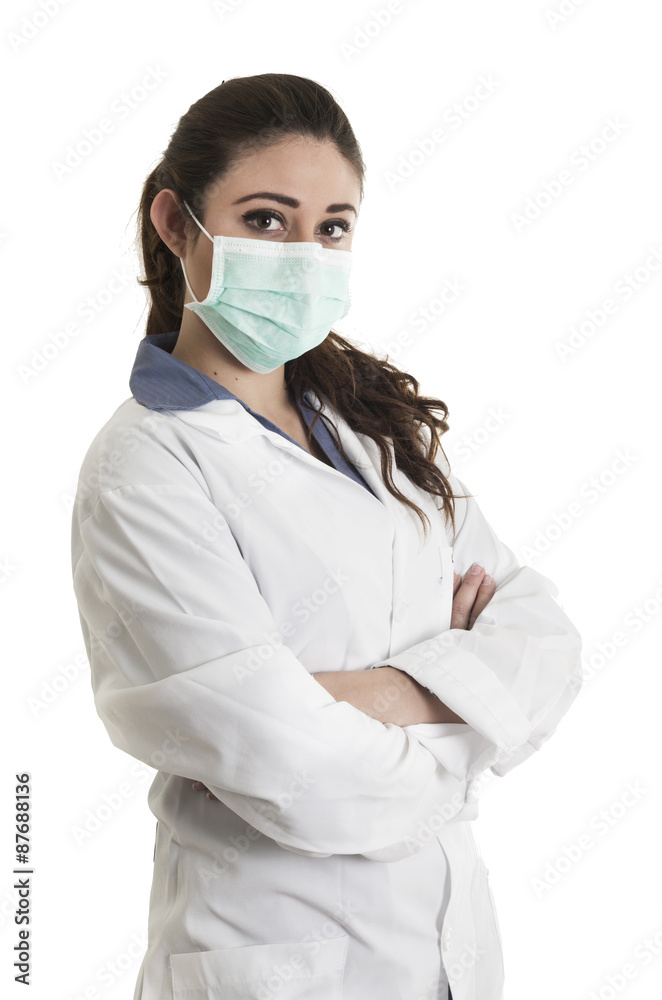 Young beautiful female doctor wearing a mask Young beautiful female doctor wearing a mask