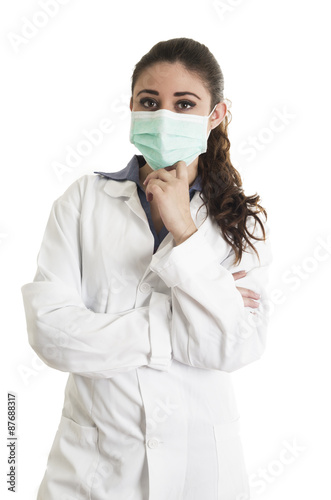 Young beautiful female doctor wearing a mask