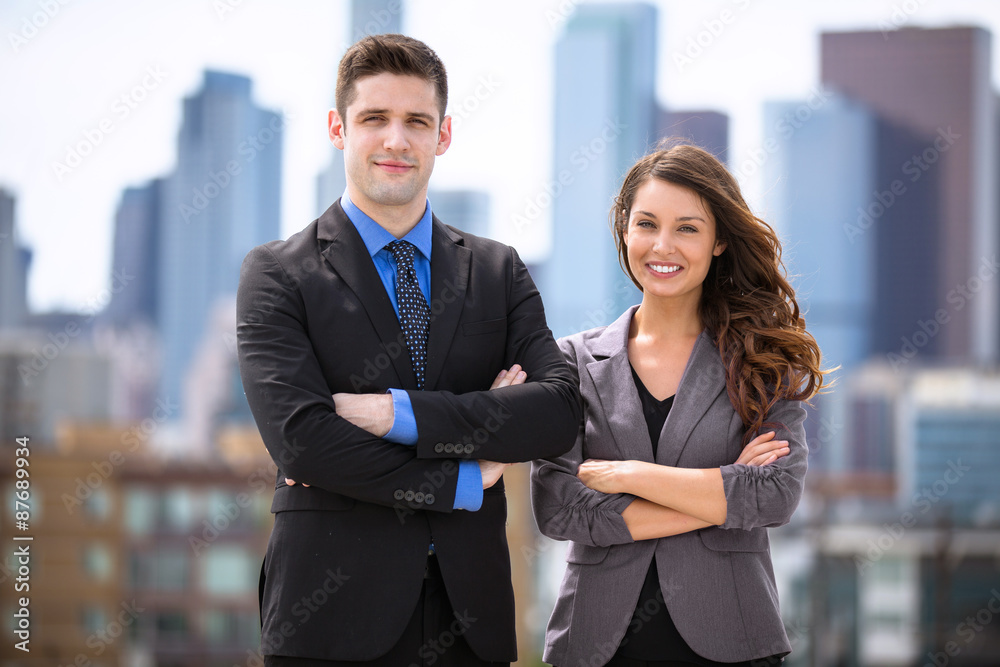Business attorneys arms crossed portrait in the city downtown Business attorneys arms crossed portrait in the city downtown